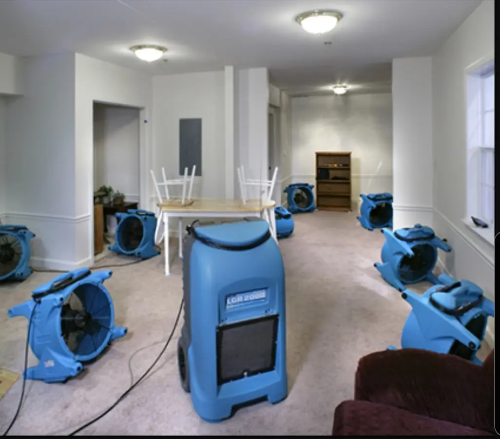 Air movers and dehumidifier setup for Water Damage Restoration in Richmond Hill
